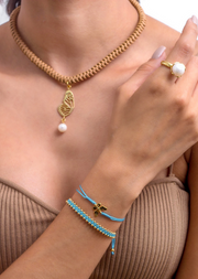 Anillo Media Esfera Monarca y Perla Oro